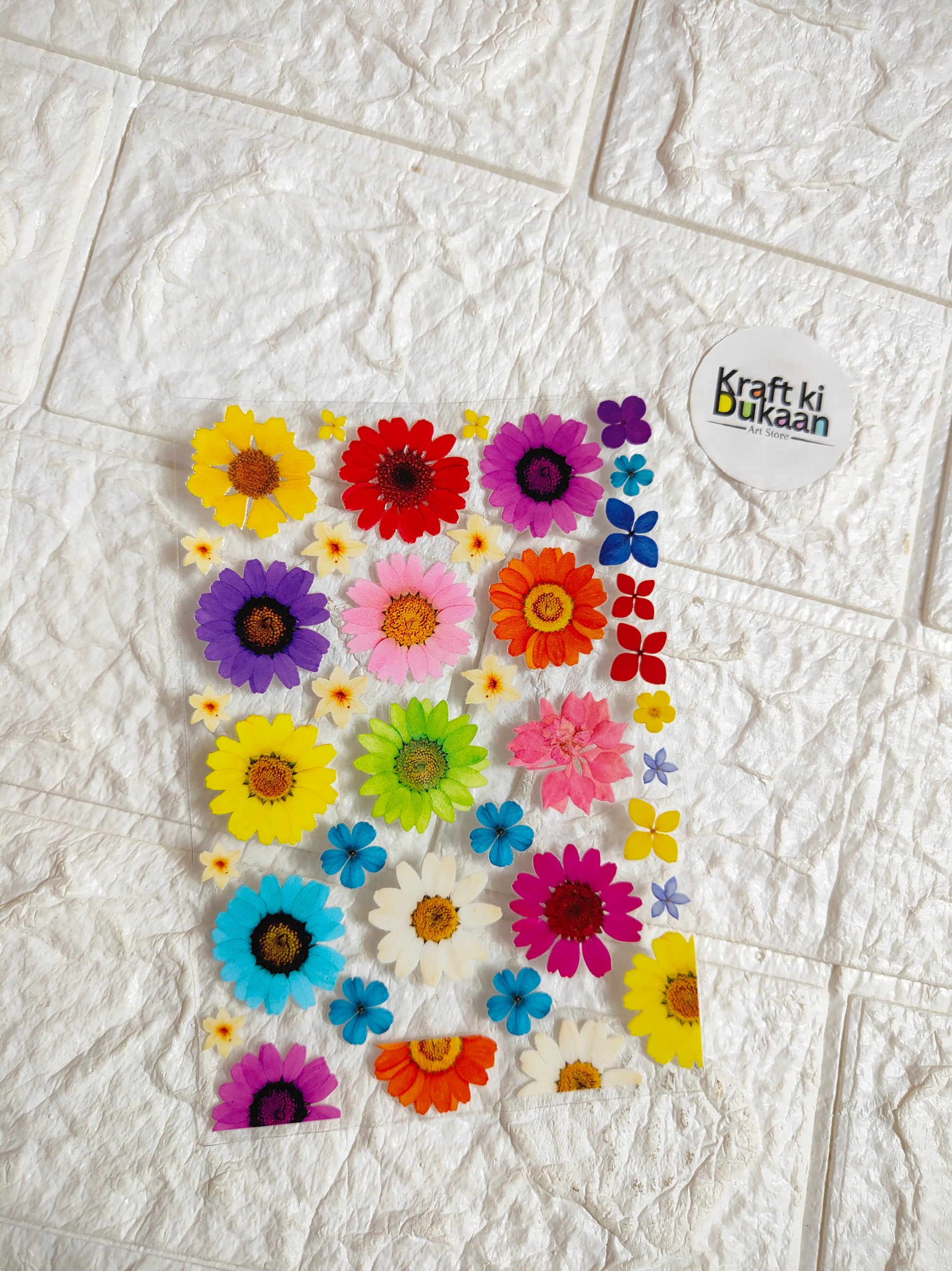 Flower sticker sheet with colorful 3D-like blossoms, peel-off design