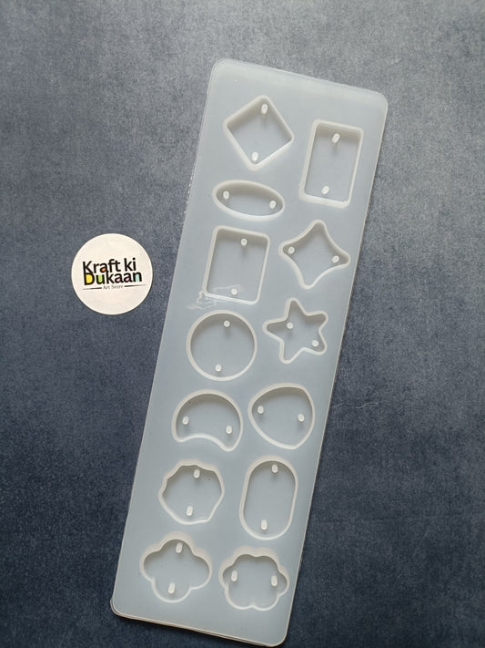 Rakhi mould with 12 cavities, light blue silicone insert with star, oval, and flower cavities