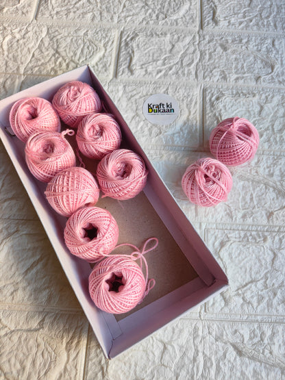 Rakhi thread roll set, light pink yarn balls with loose thread ends