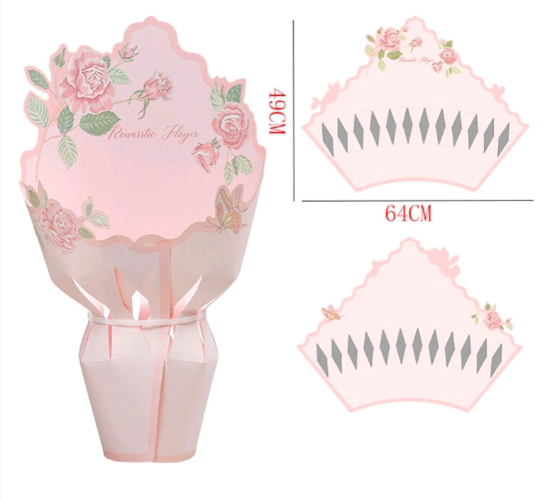 Pastel pink floral cardboard flower wrap with candle holder, size markings on layout