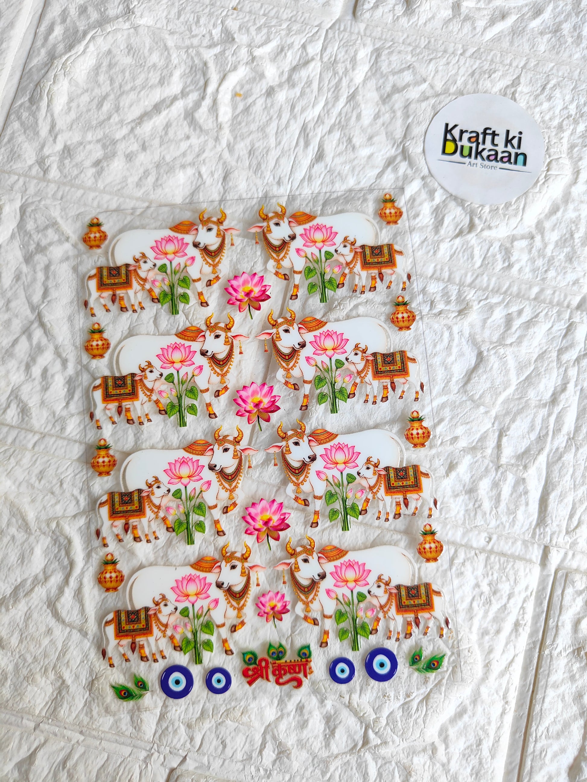 UV DTF peel-off sticker sheet with cartoon faces, pink flowers, and orange decorative motifs
