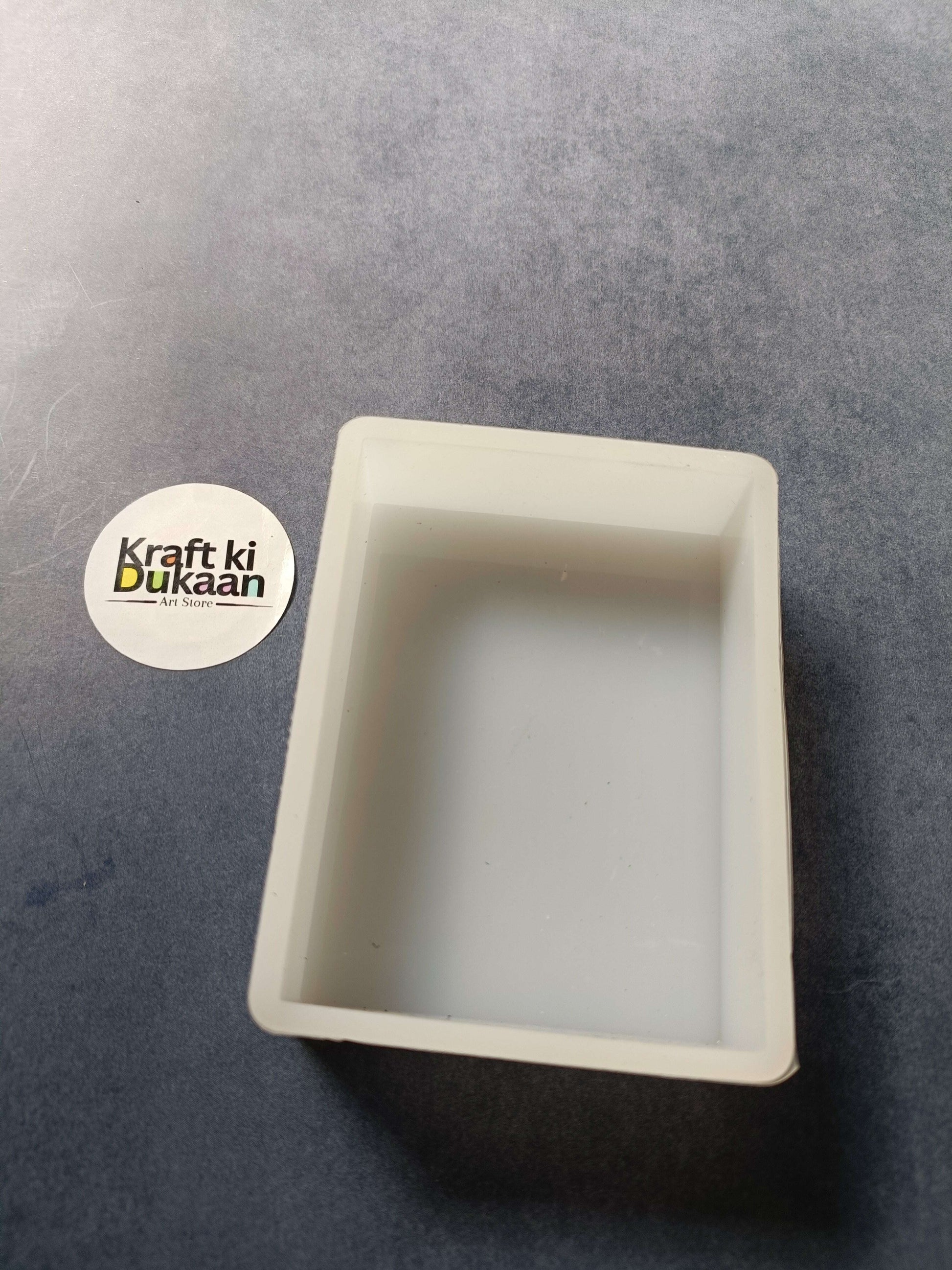 Rectangular deep mould, off-white, 6.5 x 11 cm, open cavity with raised rim