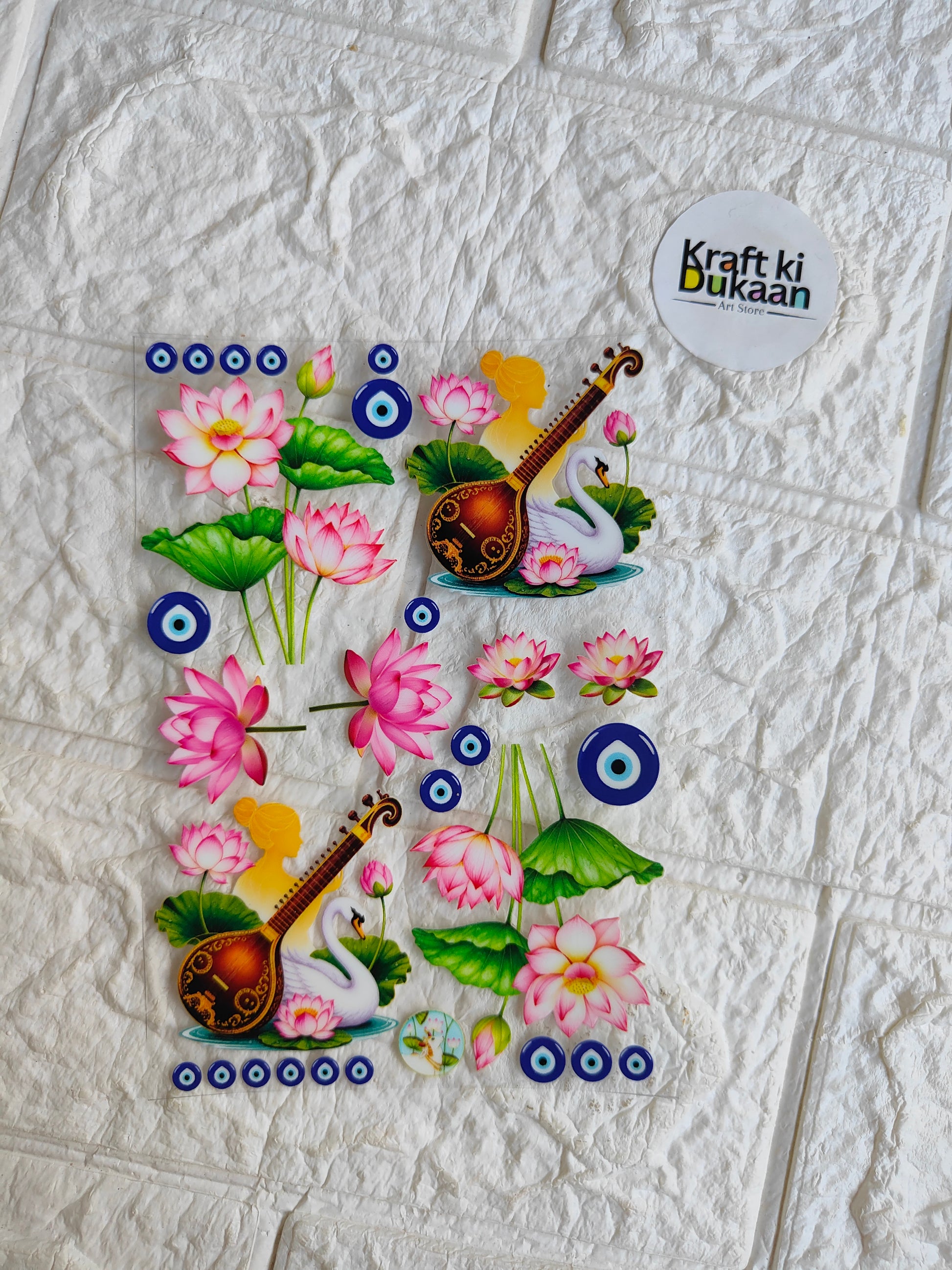 Peel-off sticker sheet with pink flowers, blue motifs, guitar and swan graphics
