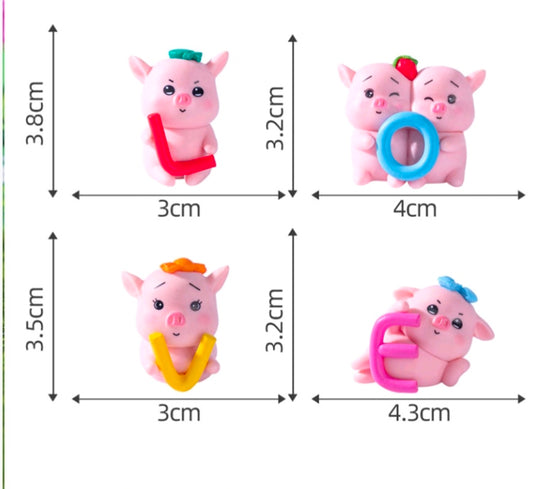 Set of 4 mini pig figurines with red, blue ring, orange hat, and pink ring