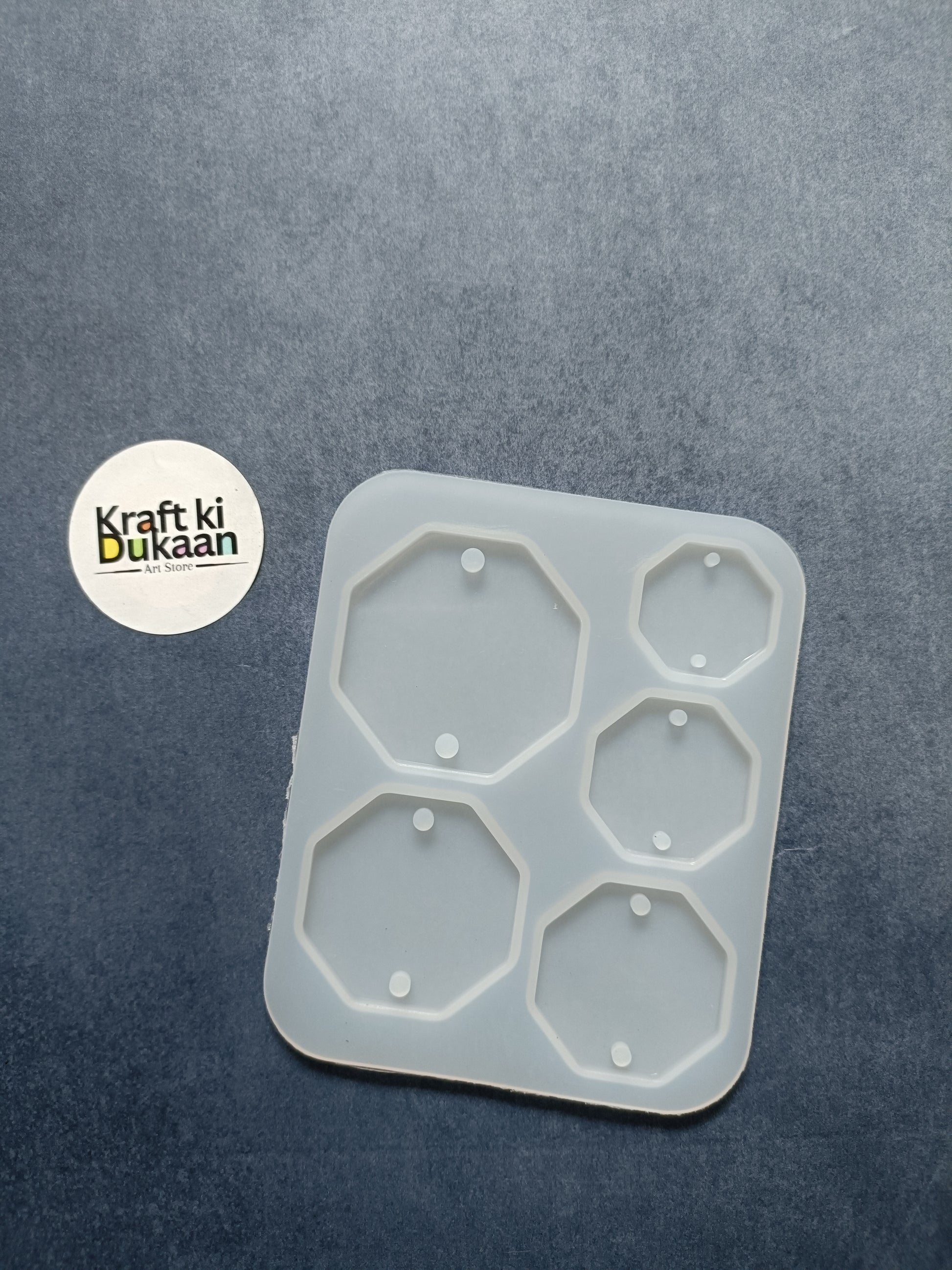 Octagon 5-cavity rakhi mould with five hexagonal compartments and raised edges