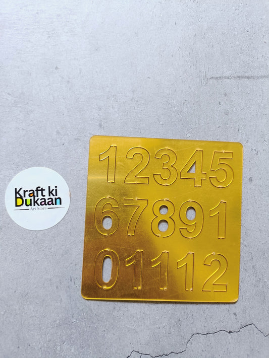 Gold acrylic number tile with raised digits 0–9 and 12345