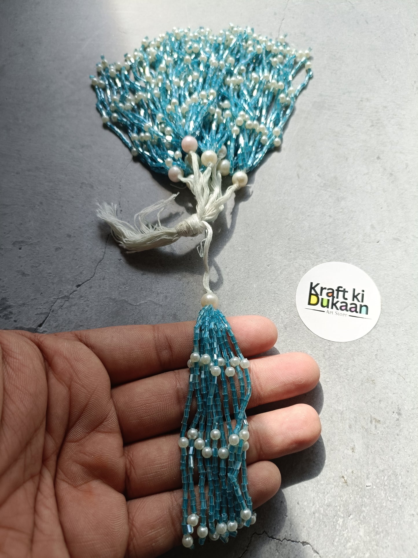 Blue beaded tassel latkan charm with pearl beads and hanging loop