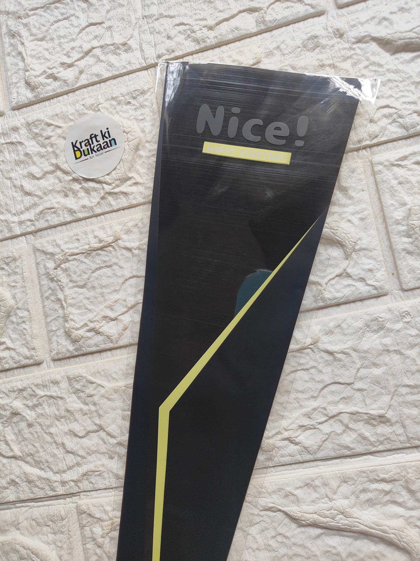 Flower cover sleeve, black with “Nice!” and neon yellow diagonal stripe accents