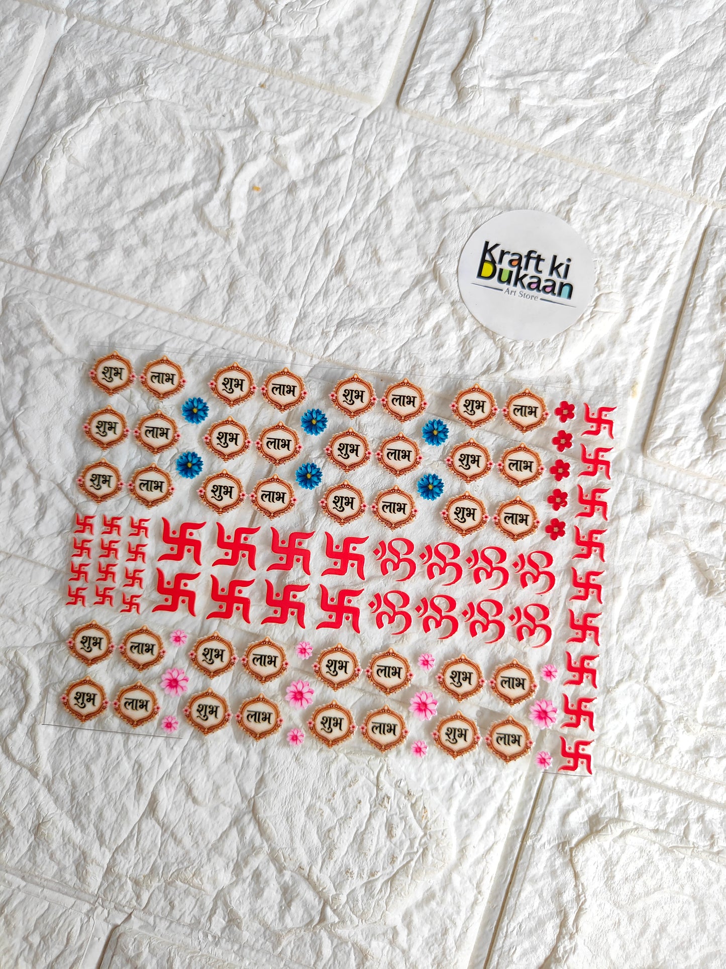 UV DTF peel-off sticker sheet with rows of small round orange cartoon icons