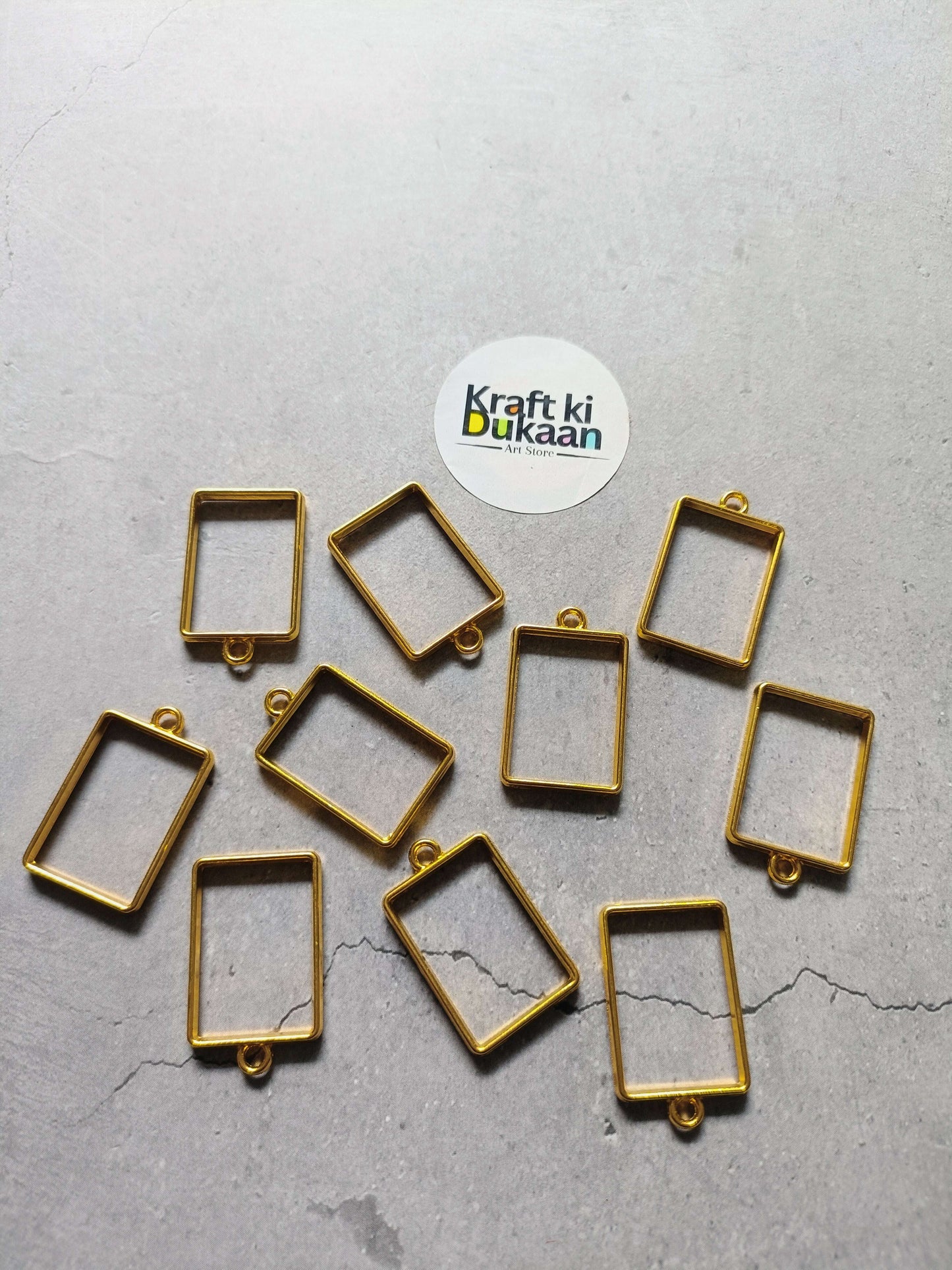 Rectangle bezel pendant set: 10 gold metal frames with bail loops