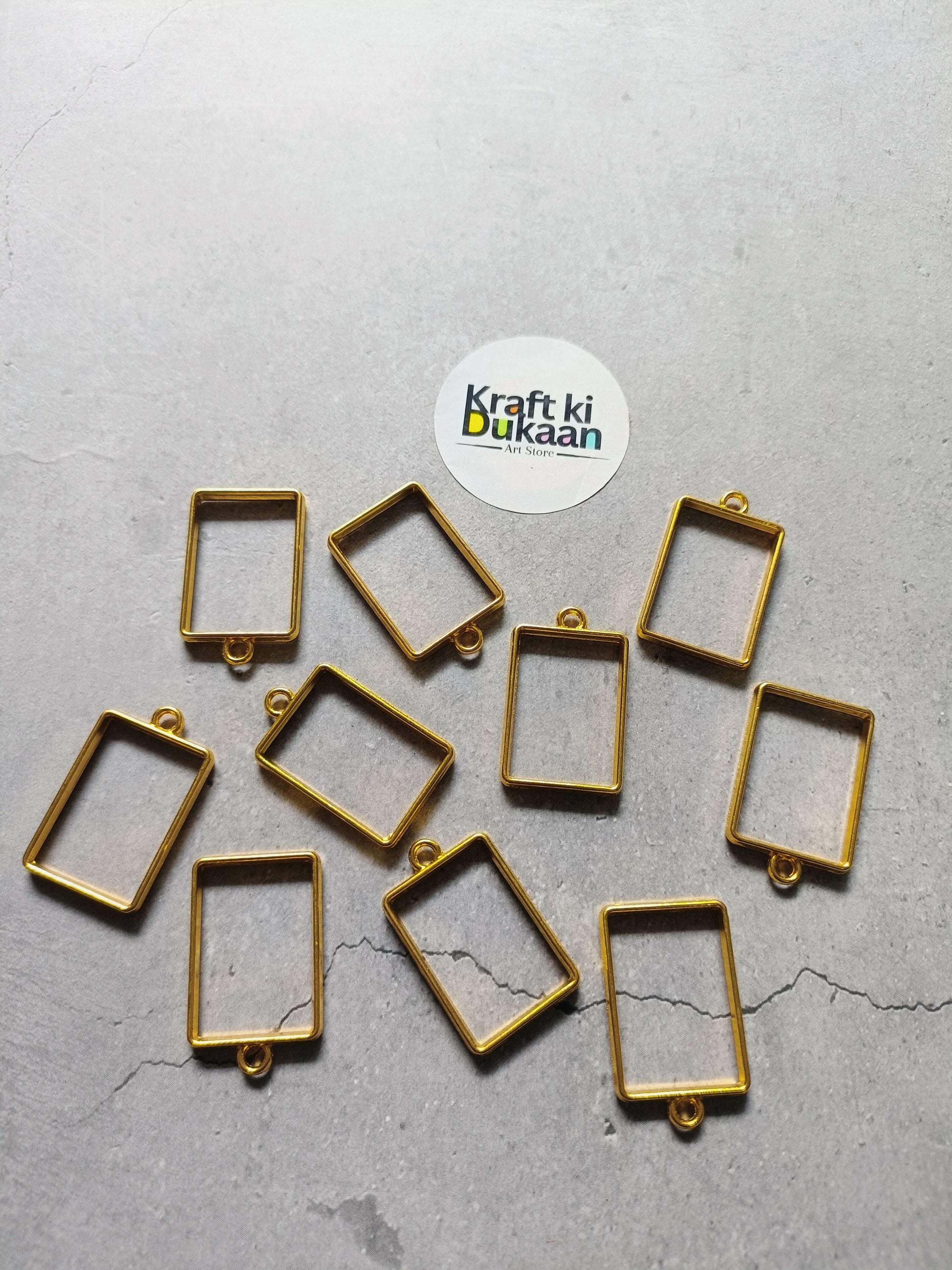 Rectangle bezel pendant set: 10 gold metal frames with bail loops