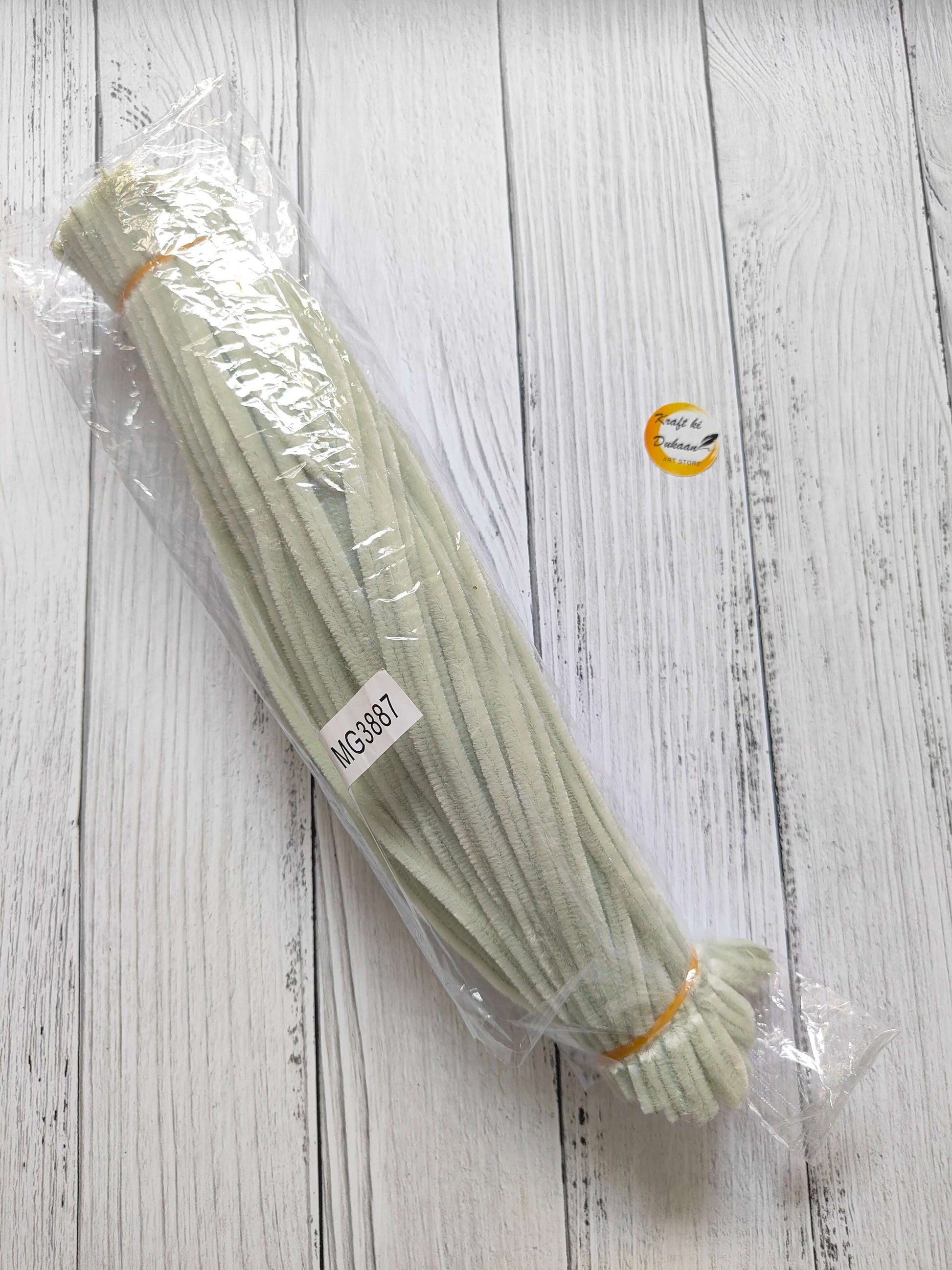 Pipe cleaner plain pack of 100, light sage green curl sticks in plastic wrap