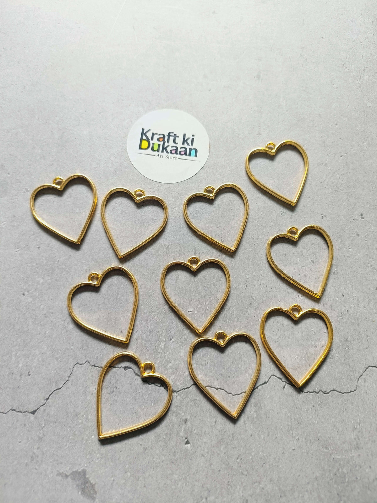 Heart bezel pendant set of 10, gold tone plain heart frames.