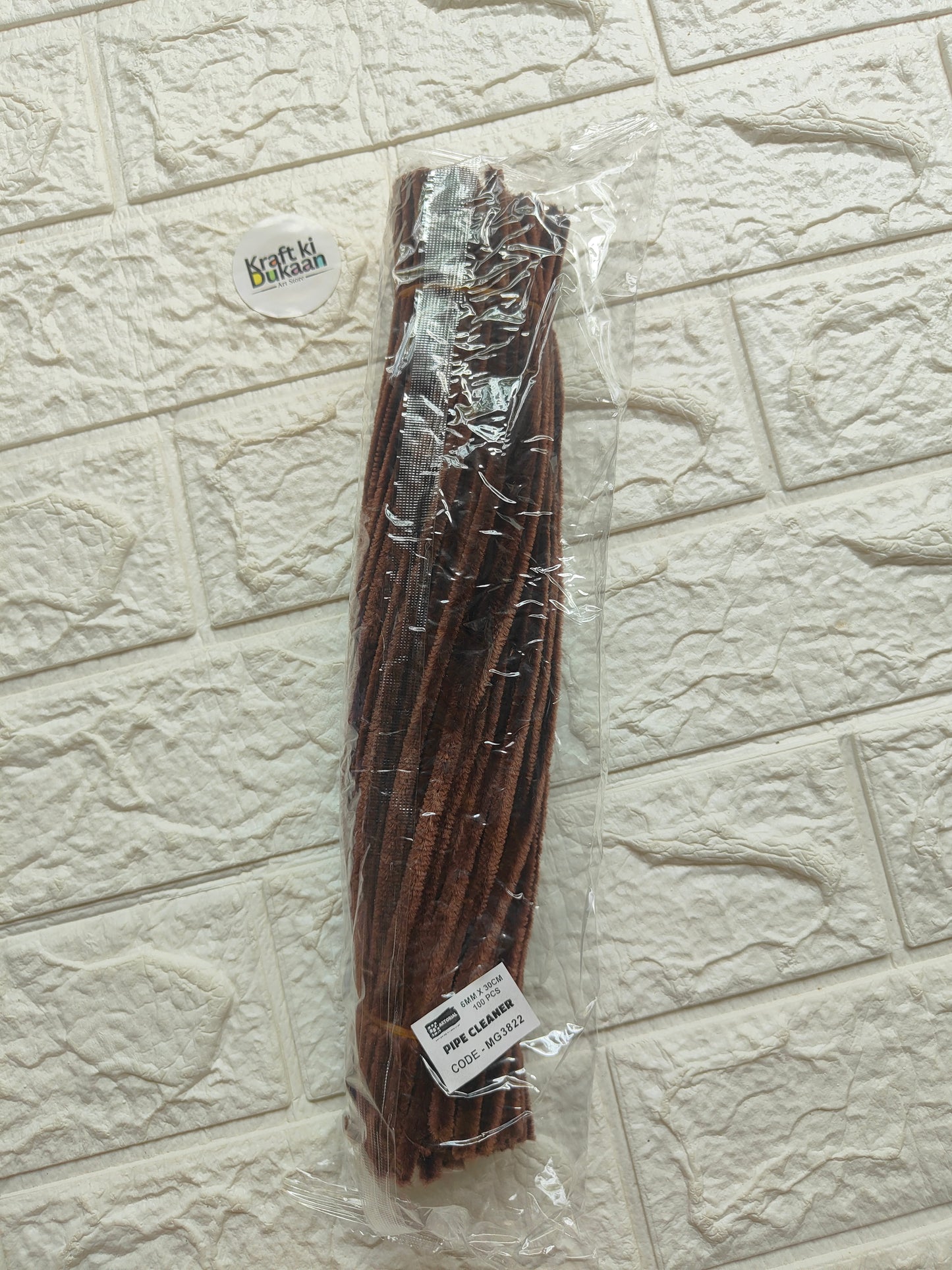 Dark brown pipe cleaners in clear plastic pack, bundled twisty chenille craft sticks