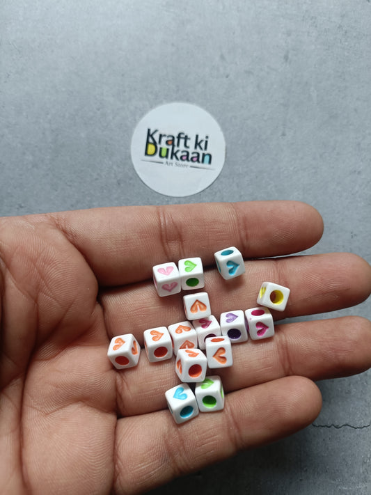 Rakhi bracelet bead pack of 25 small cube beads with heart designs in mixed colors