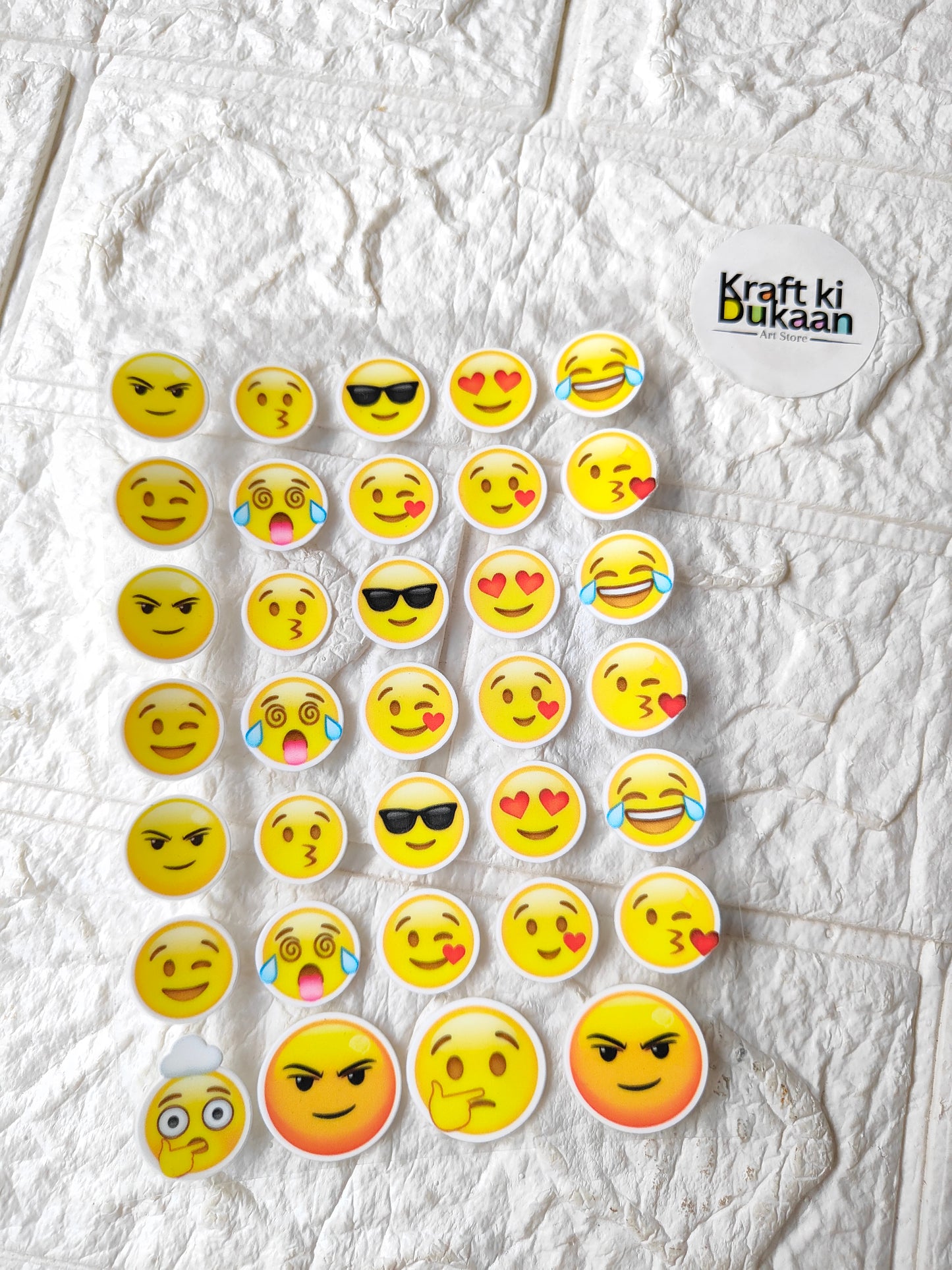 UV DTF peel-off sticker sheet with colorful emoji smiley faces, circular designs