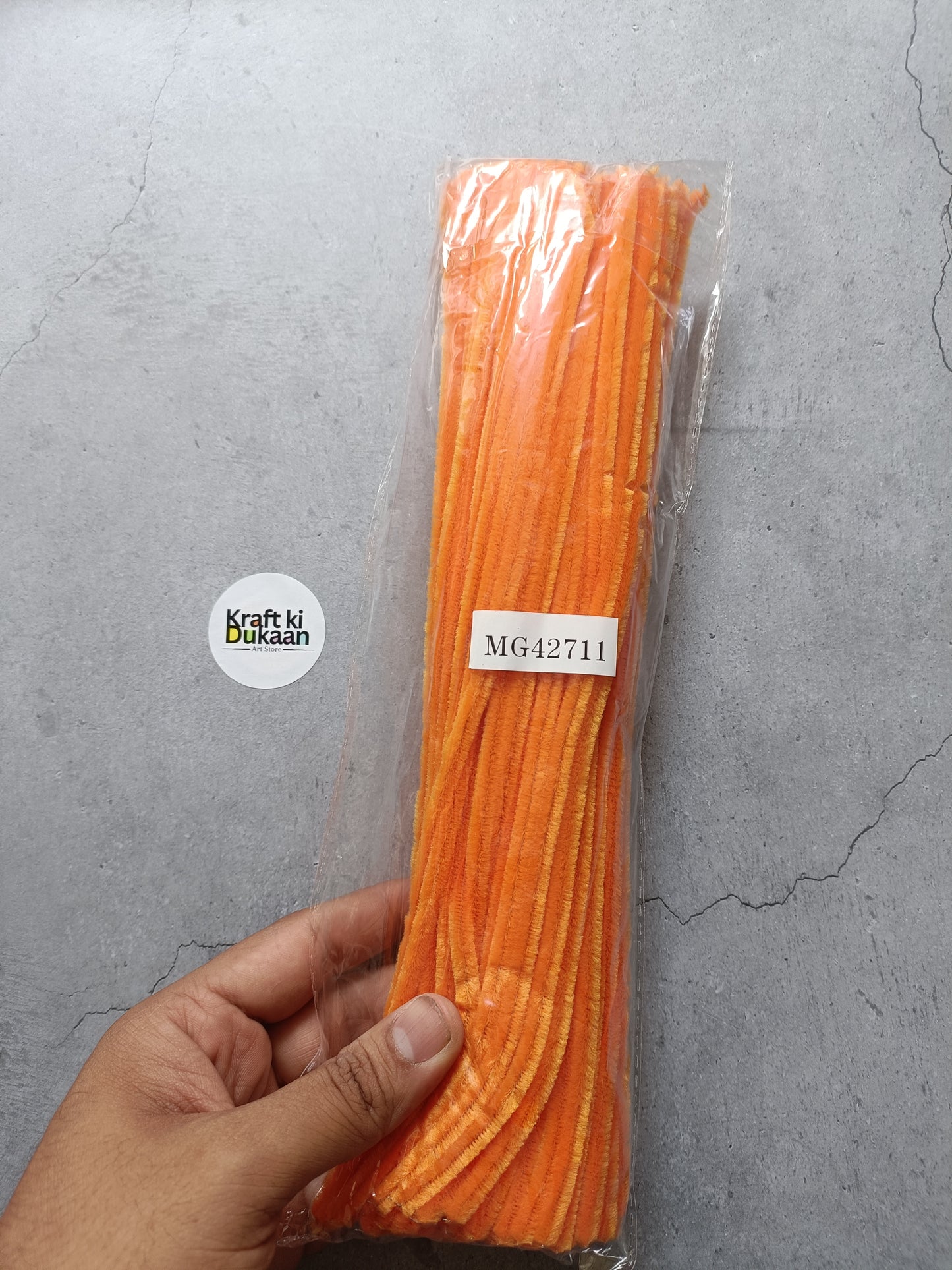 Pipe cleaner pack of 100, plain orange chenille sticks in a sealed bundle