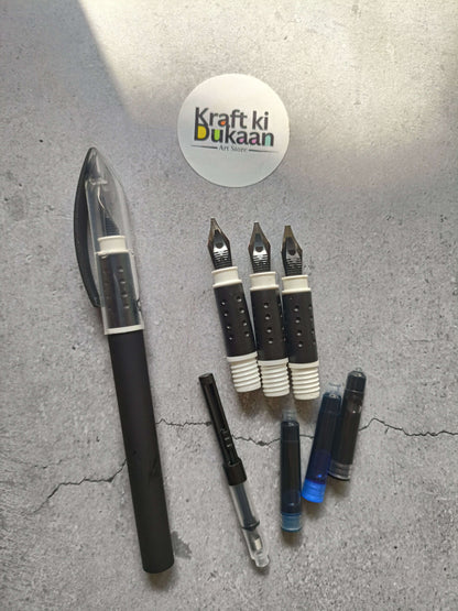 Calligraphy pen 8-piece set with black pens and metal nibs, laid out