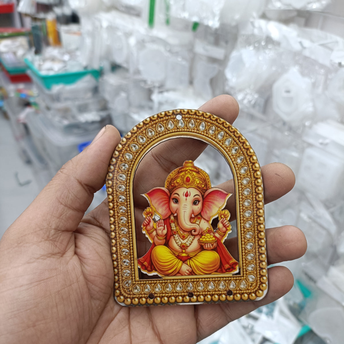 MDF Ganapti arched wall decor with gold beaded frame and seated Ganesha