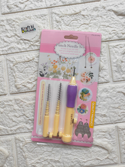 Packaged punch needle set blister with purple handle and two beige needle tools