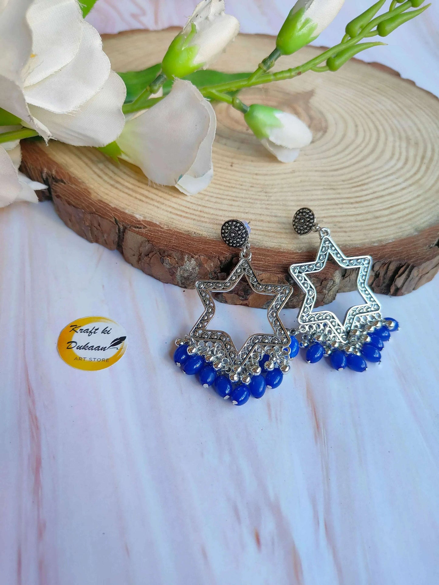 Silver Star Jhumka with blue bead fringe, silver tone star dangle earrings