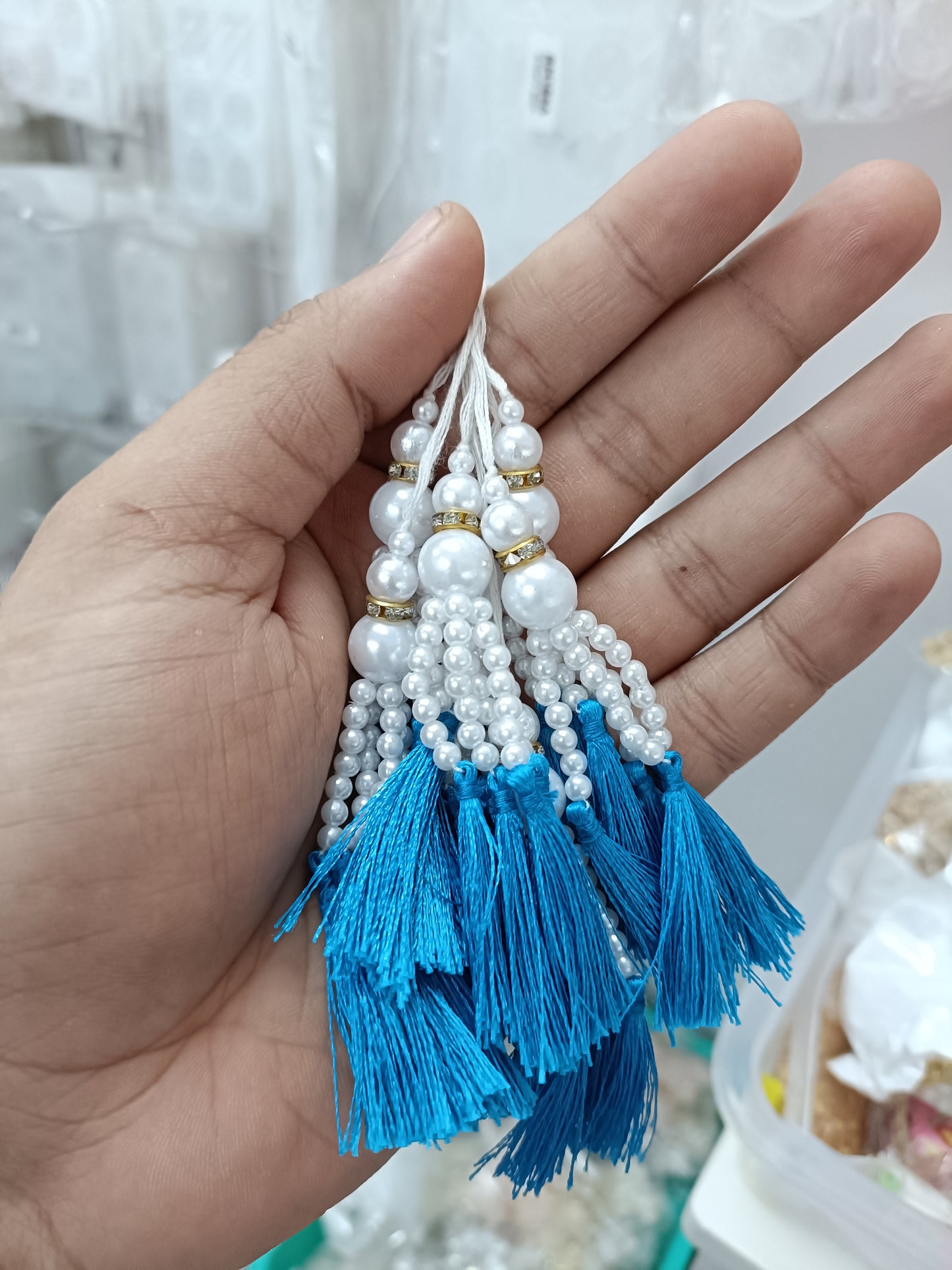 Beaded pearl latkan tassel bunch with blue silk tassels and layered white bead drops