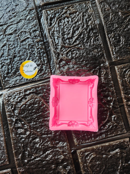 Mini square frame pink silicone mould with raised border and corner studs