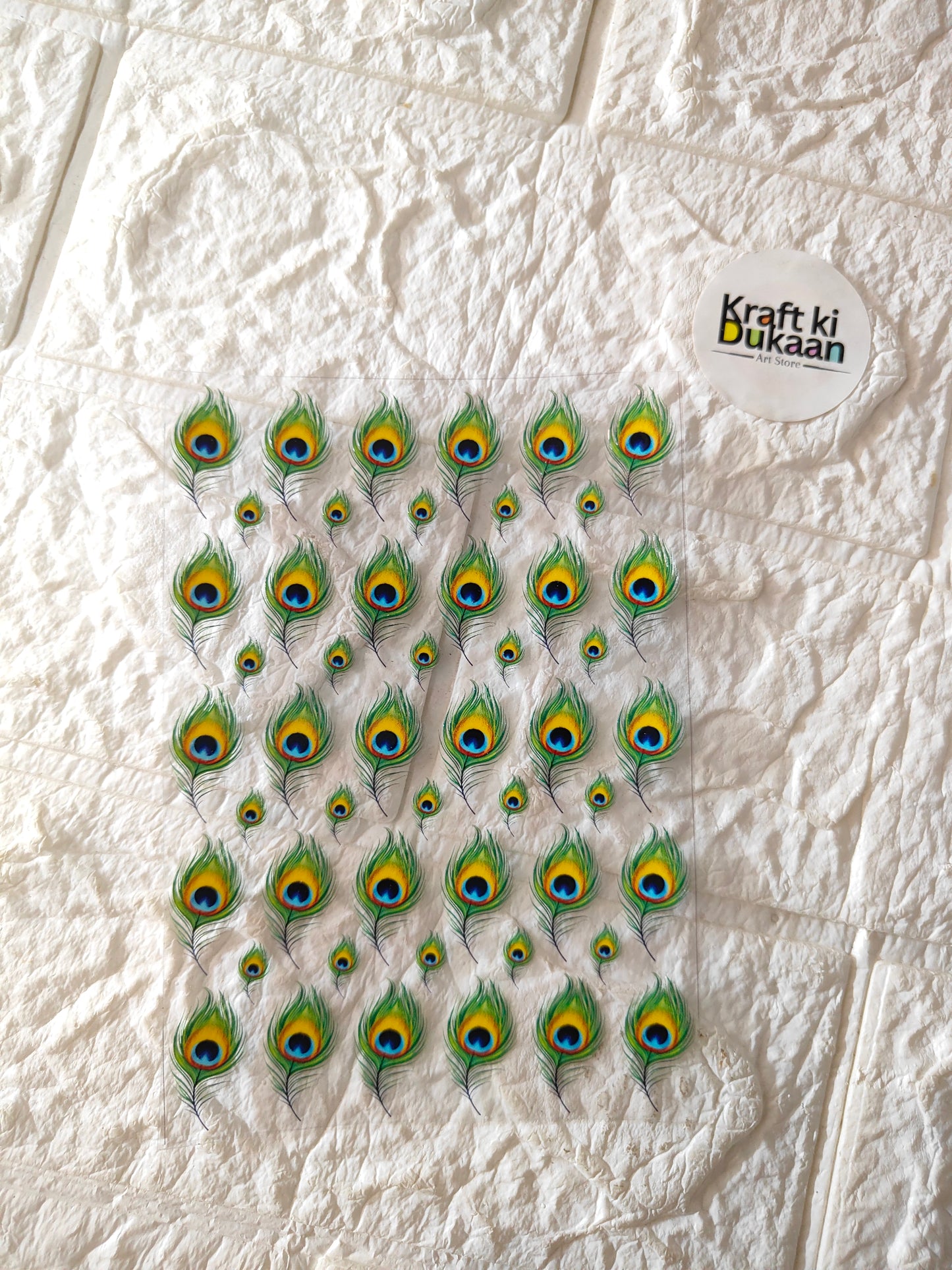 UV DTF peel-off sticker sheet with peacock-eye feather motifs (sheet of stickers).