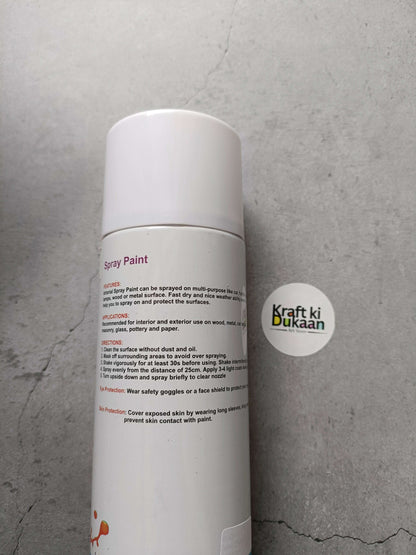 White spray paint can with side information label and round logo