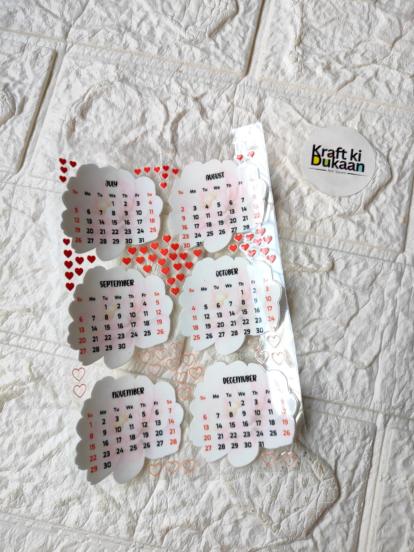 UV DTF peel-off sticker sheet with heart-themed calendar date stickers, multiple designs
