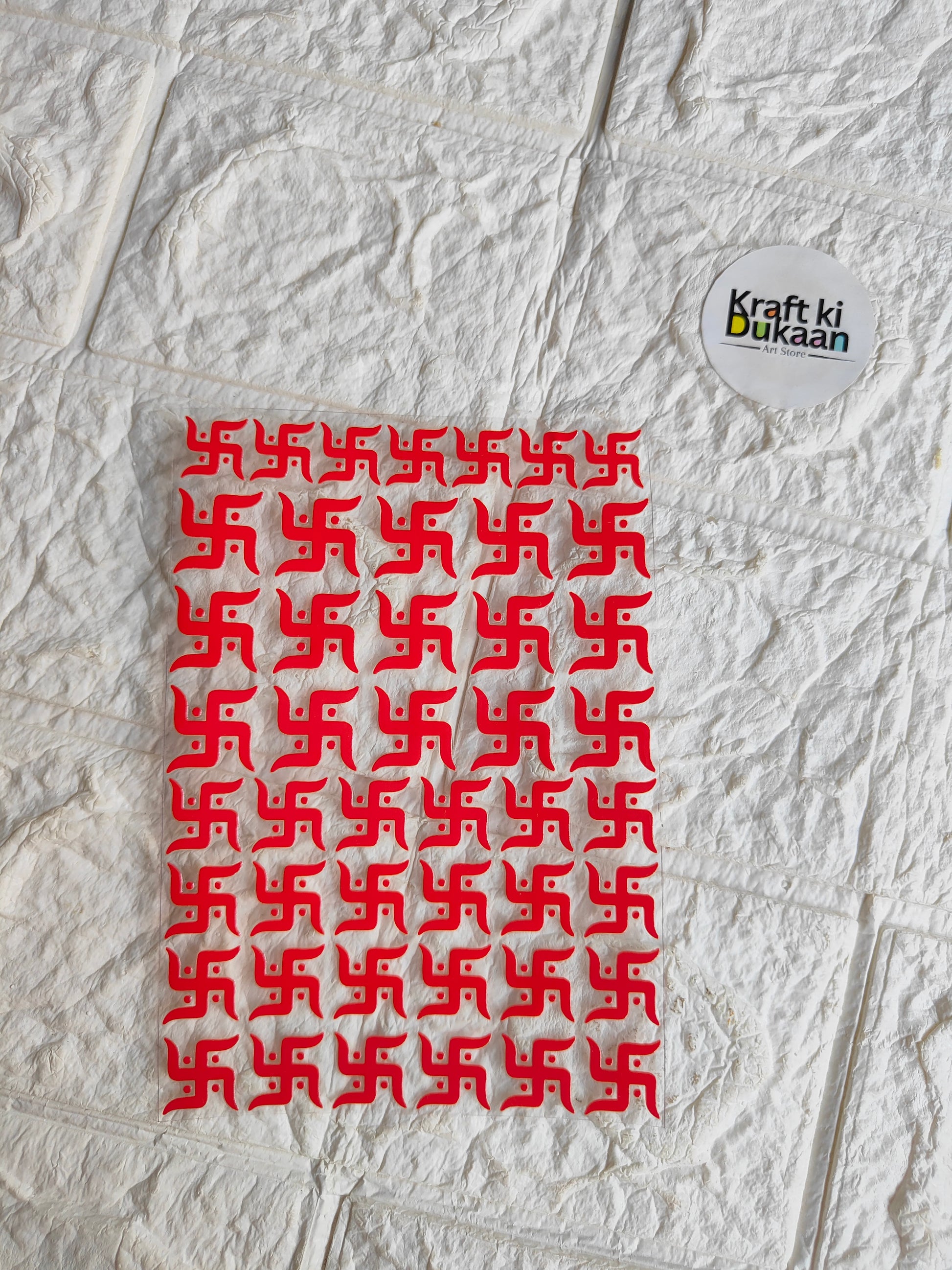 Peel-off sticker sheet with red repeating geometric pattern