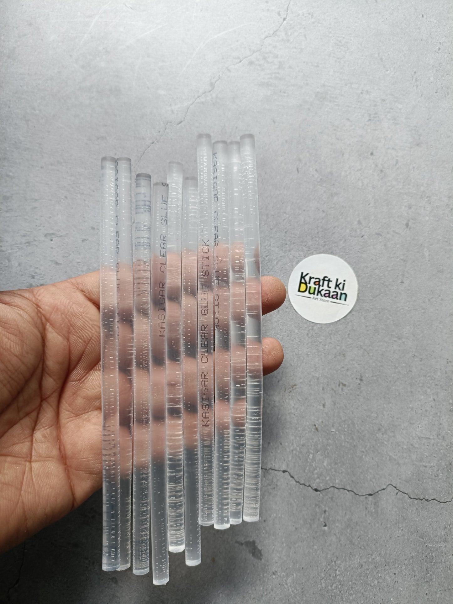 Pack of 100 thin hot glue sticks, clear translucent cylindrical sticks