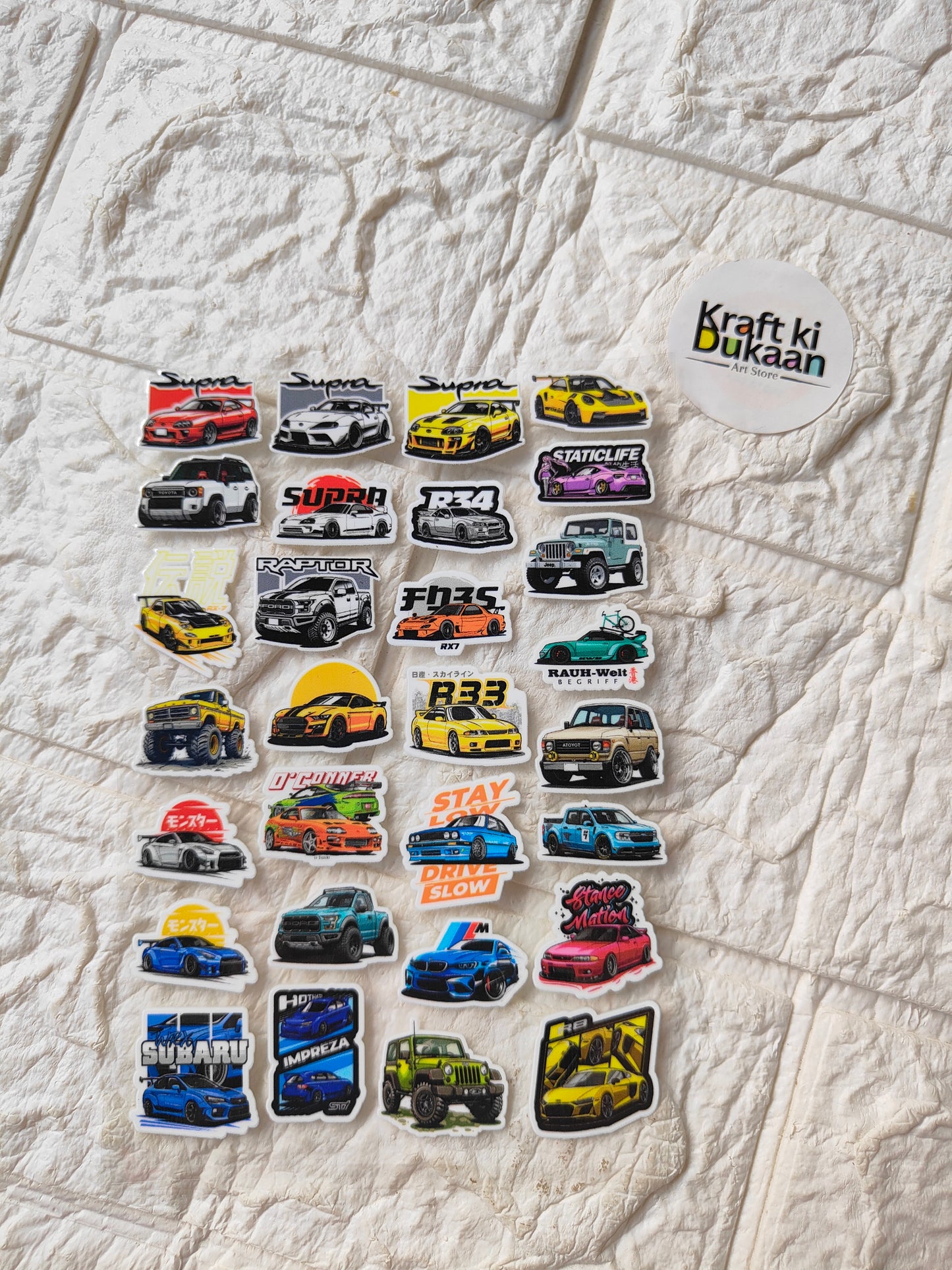 UV DTF peel-off sticker sheet with colorful racing car decals on kraft backing