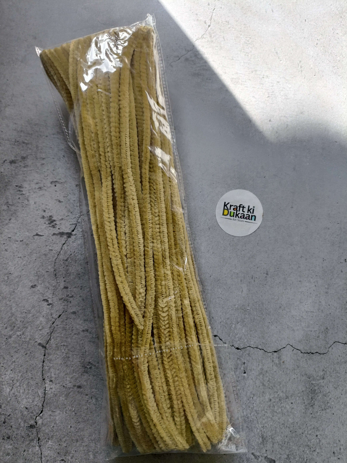 Pipe cleaners, ivory, in a sealed pack