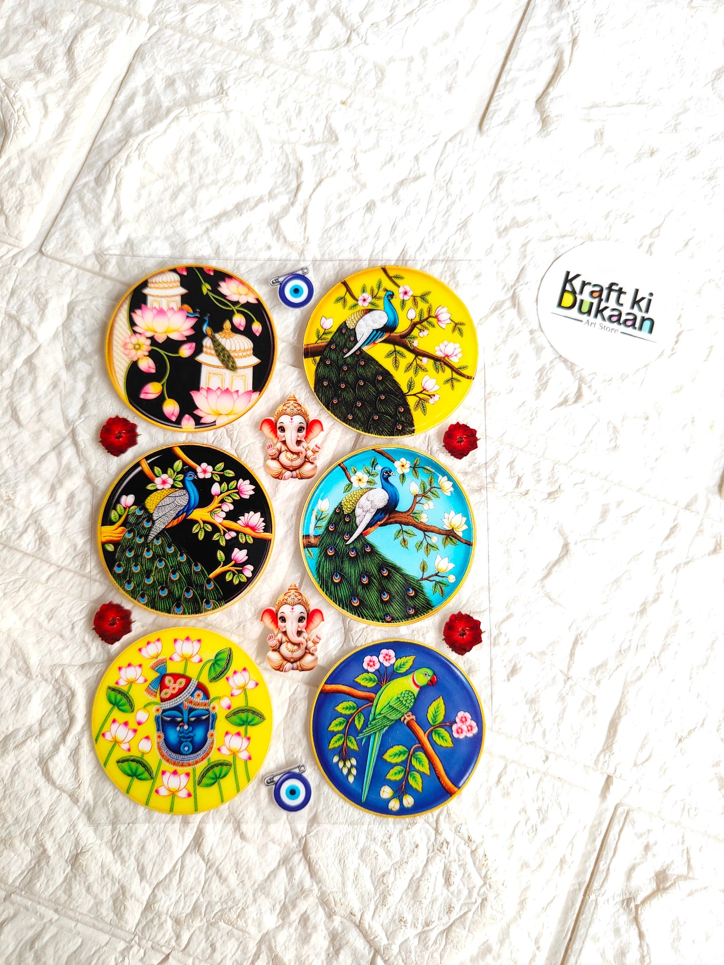 UV DTF peel-off sticker sheet with colorful circular peacock designs and small red accents