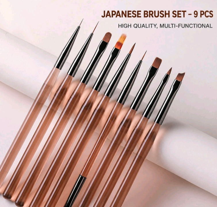 9-piece Japanese-style brush set with black bristles and copper-brown handles