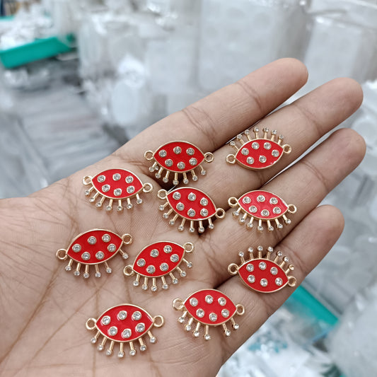 10-piece red eye enamel pendant charms with rhinestone insets and gold-tone hoops