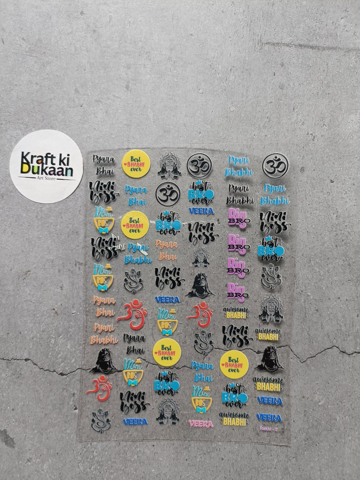 Sticker sheet with assorted UV DTF peel-off decals, multiple rows of icons