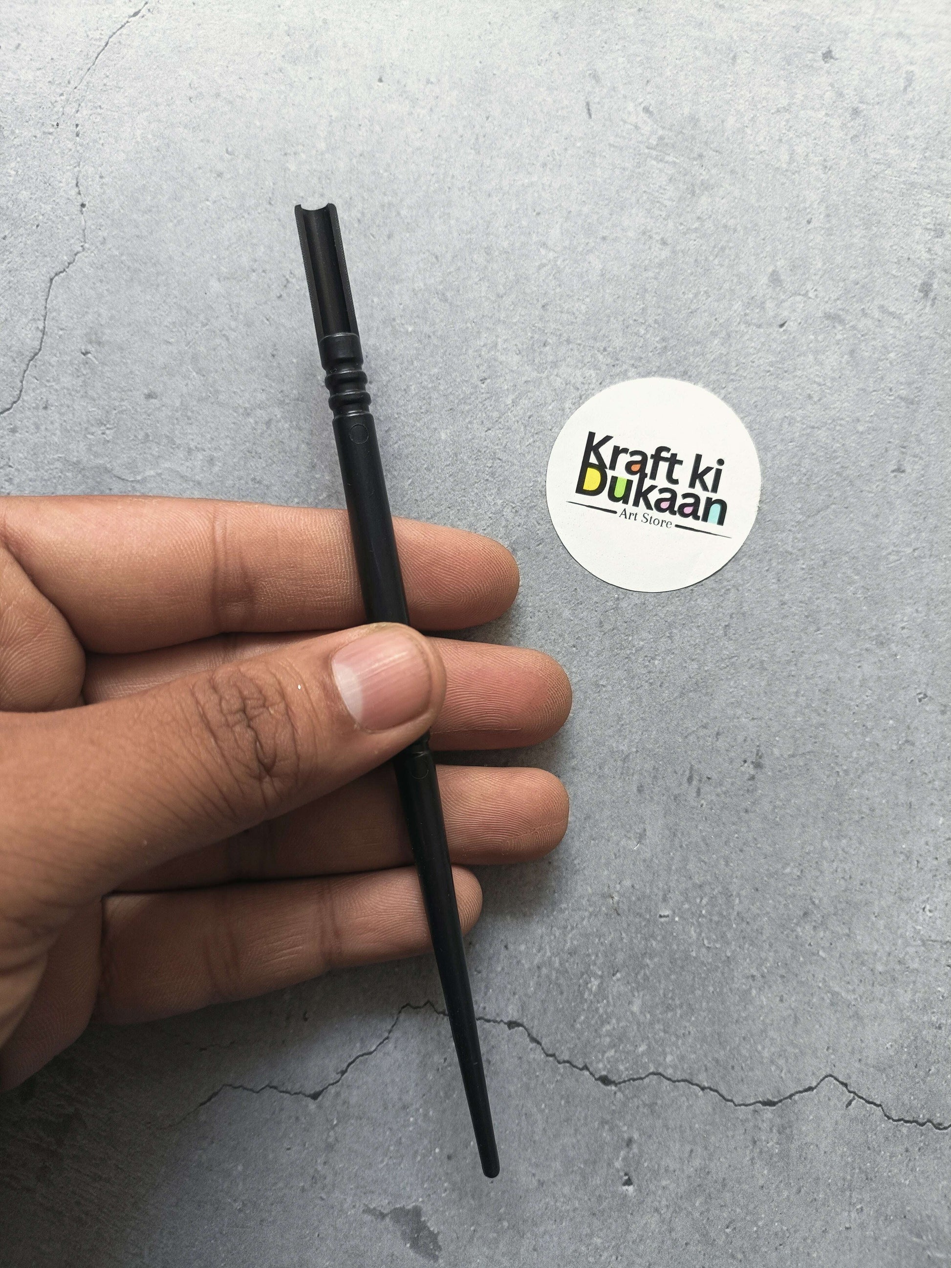 Black clay modelling chisel-tip tool with ribbed handle