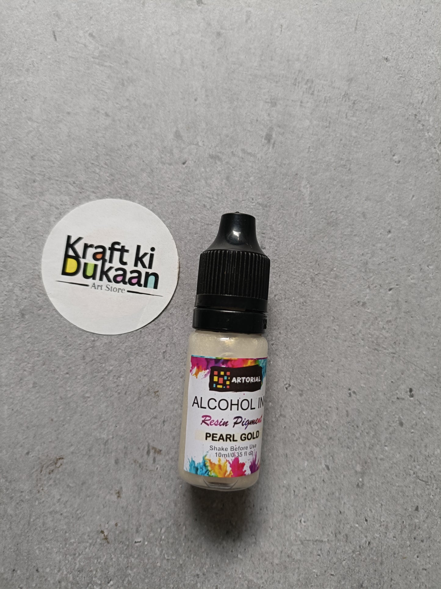 Alcohol ink bottle with black cap, pearl gold resin pigment label