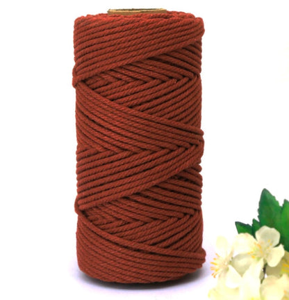 Dark brown macrame cotton thread spool with tightly wound 5mm cord