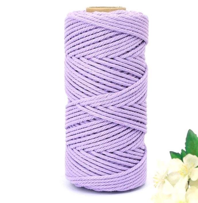 Light purple macrame cotton thread spool with tightly wound 5mm cord