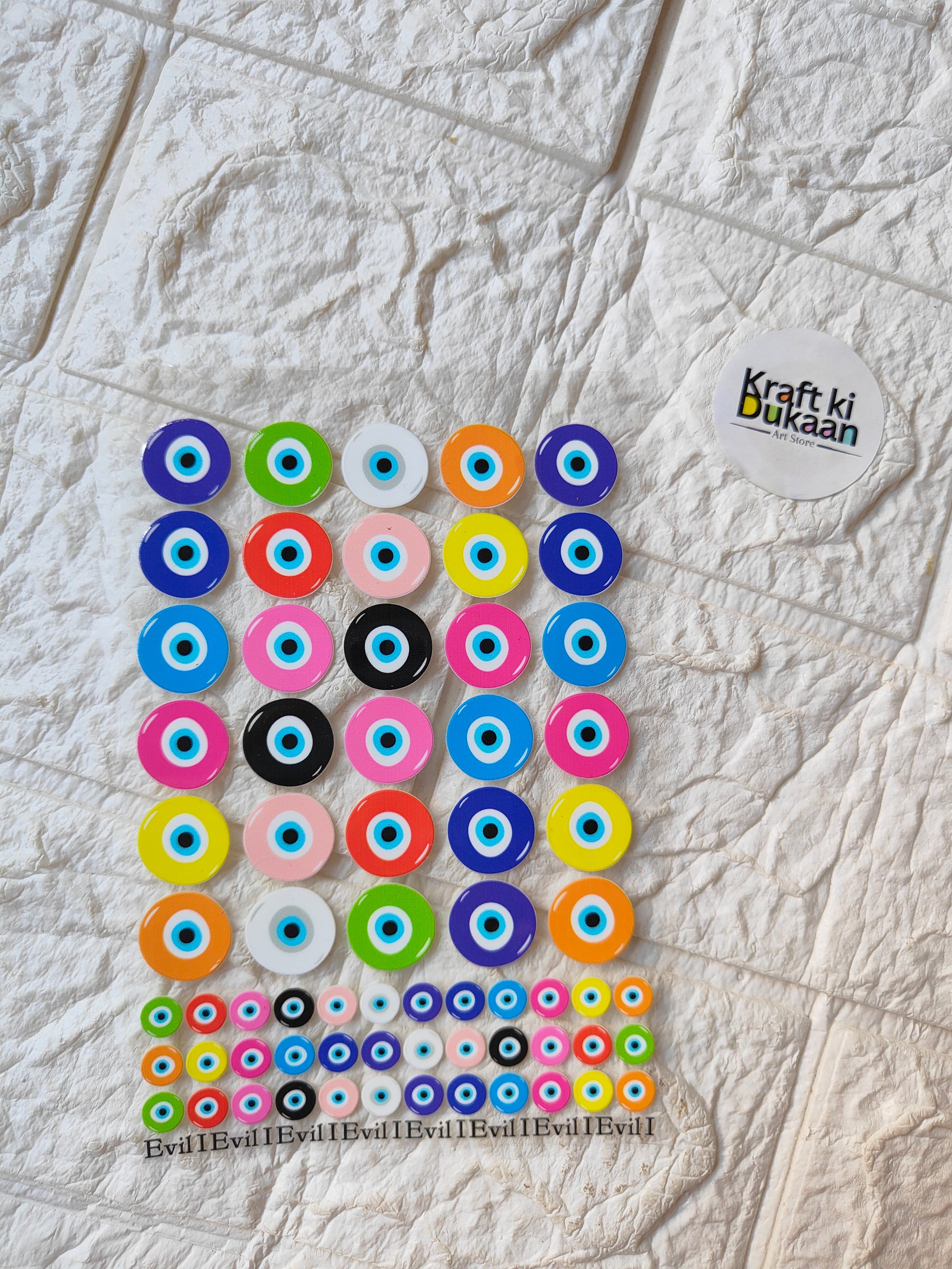 UV DTF peel-off sticker sheet with colorful circular eye-style designs