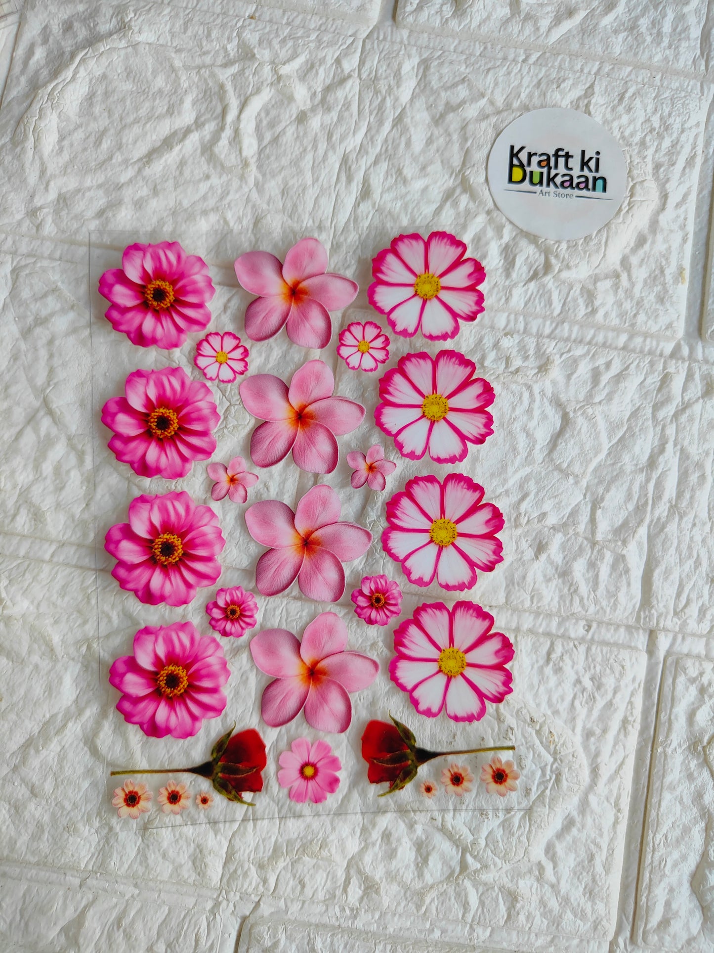 Peel-off UV DTF sticker sheet with pink and magenta flower designs