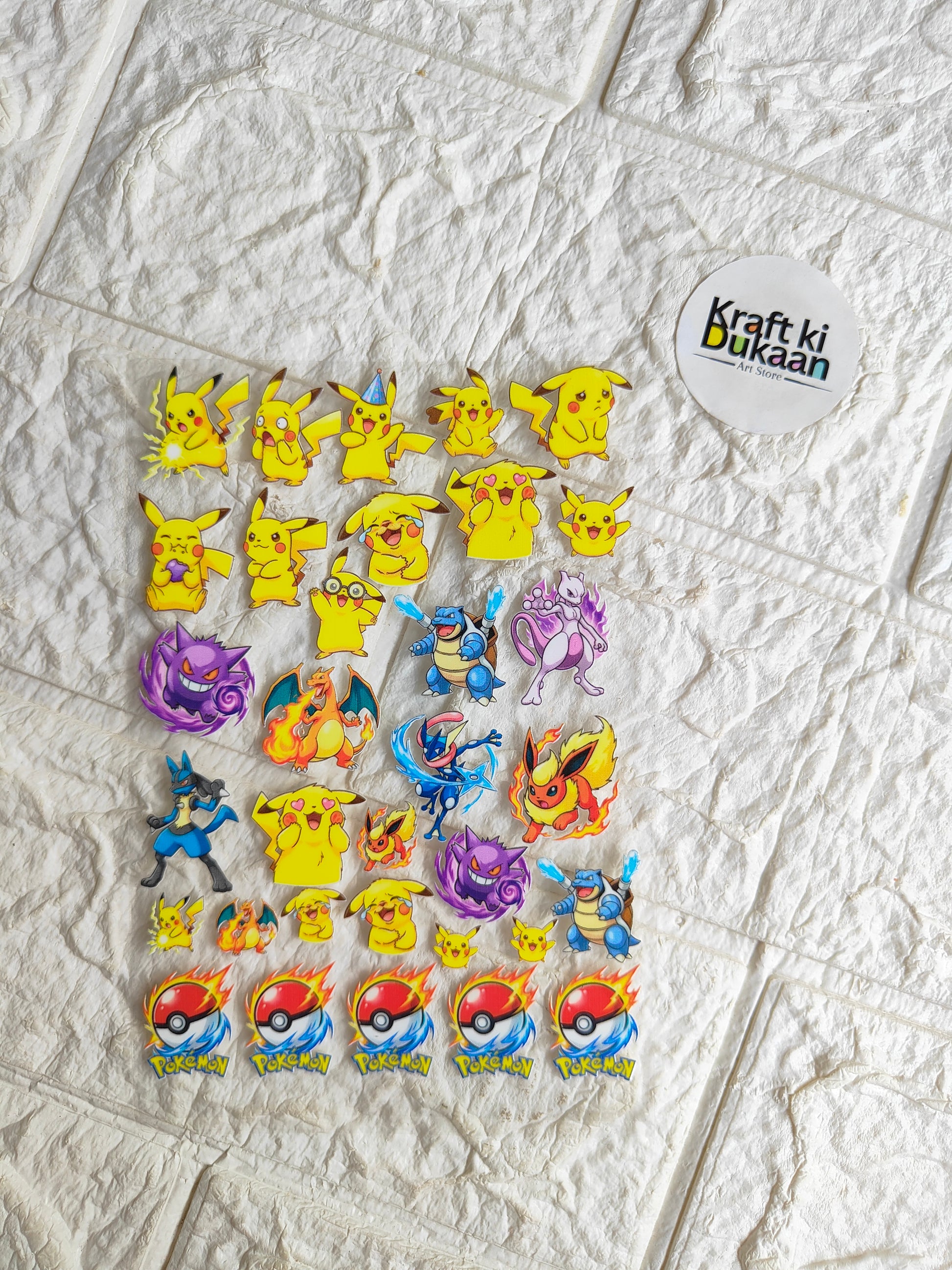 Peel-off sticker sheet with colorful cartoon monster designs, yellow and purple characters