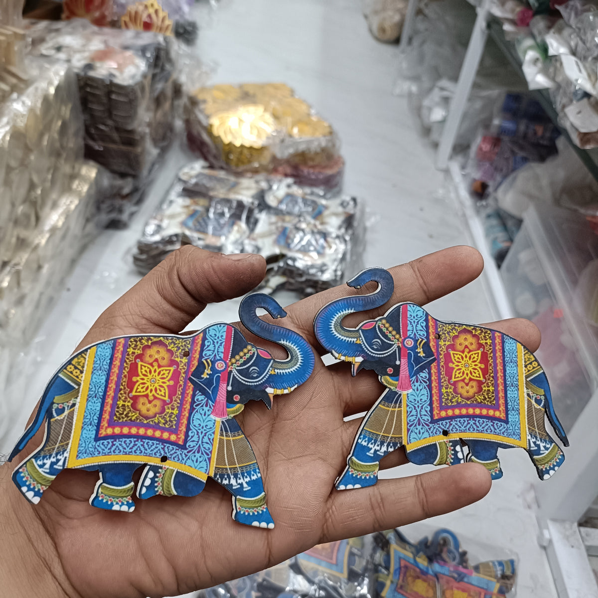 Blue and multicolor MDF elephant cutout pair with ornate patterned details