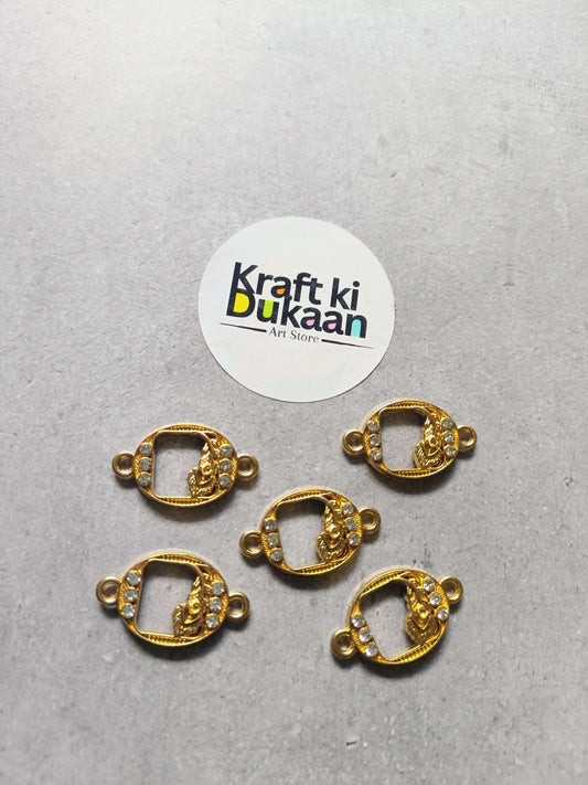 Five gold-tone oval rakhi bracelet bezels with rhinestones and side loops