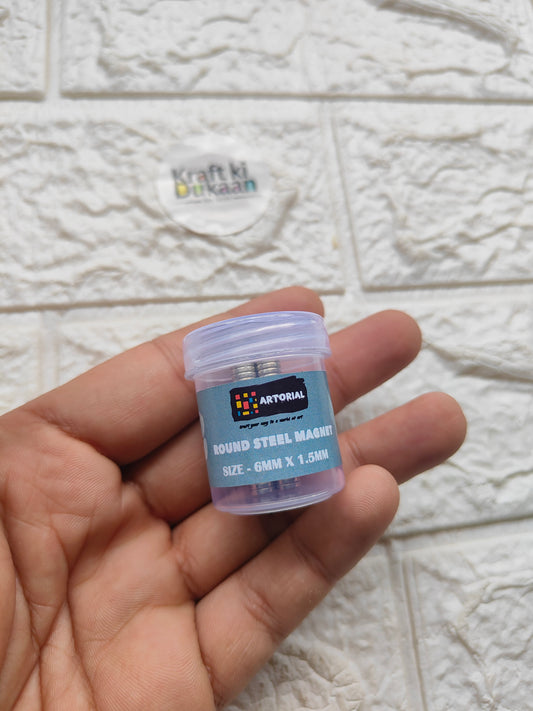 Clear plastic jar of round steel magnets, label showing size 6x1.5mm