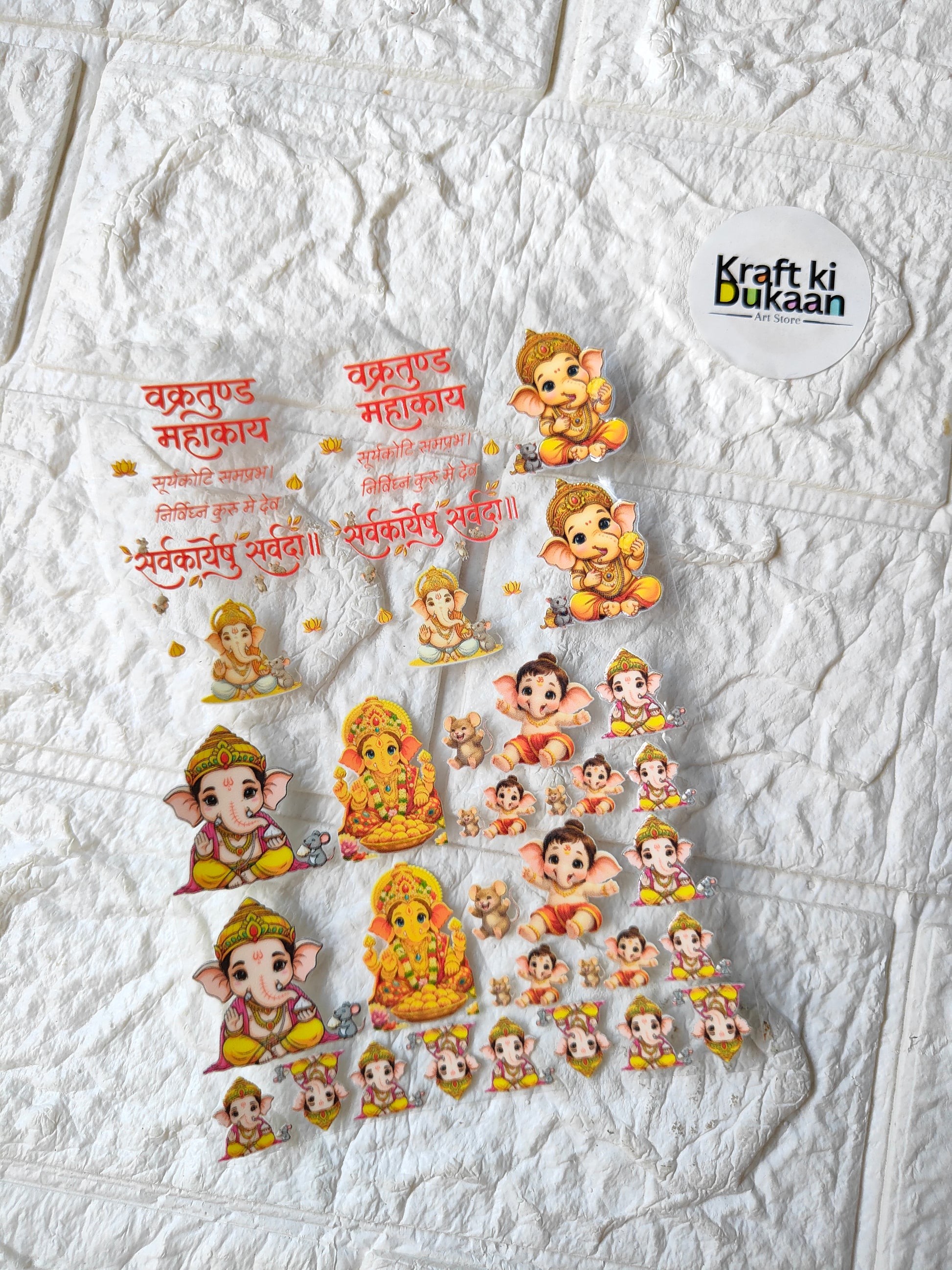 UV DTF peel-off sticker sheet with multiple cartoon child deity figures and red text