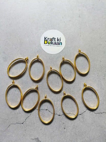 Gold oval bezel pendant set of 10, plain linked frames with small eye hooks
